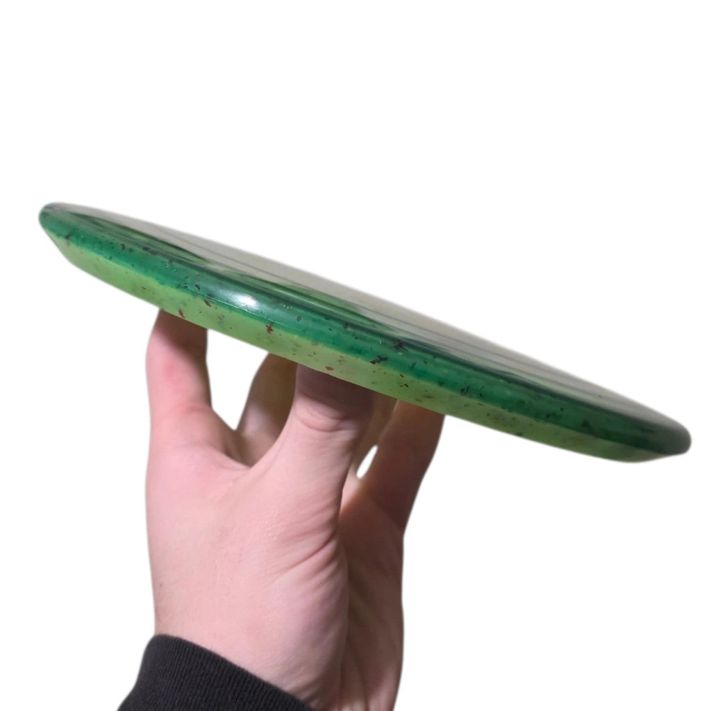 Emerald and teal dye on Doomsday Discs Area 51 in Clandestine plastic, side profile