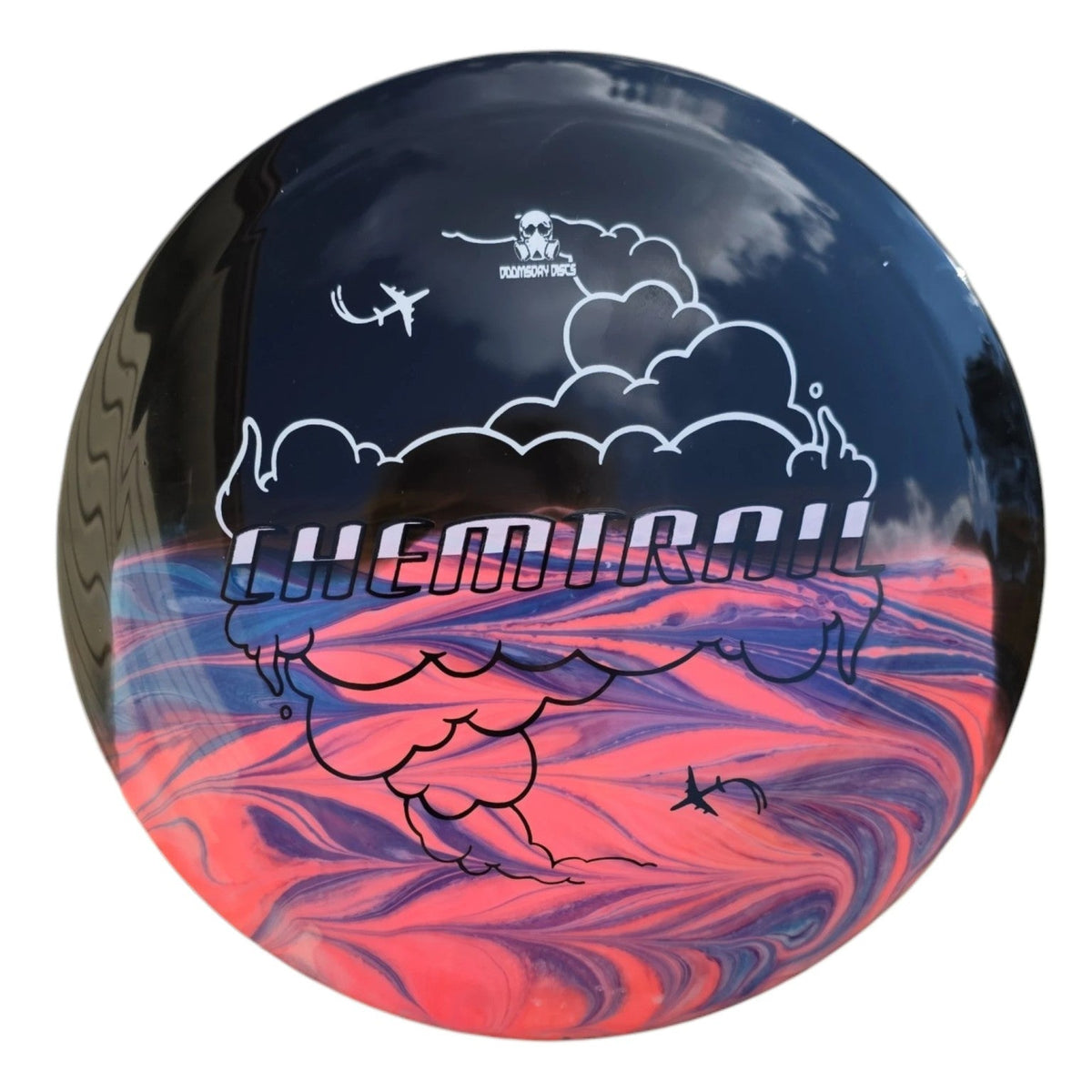 Front of hand-dyed Doomsday Chemtrail in Retina plastic, black upper field with coral and purple swirls below