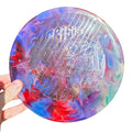 Blue and red hand-dyed Doomsday Crisis in Glow Isolation plastic, front view