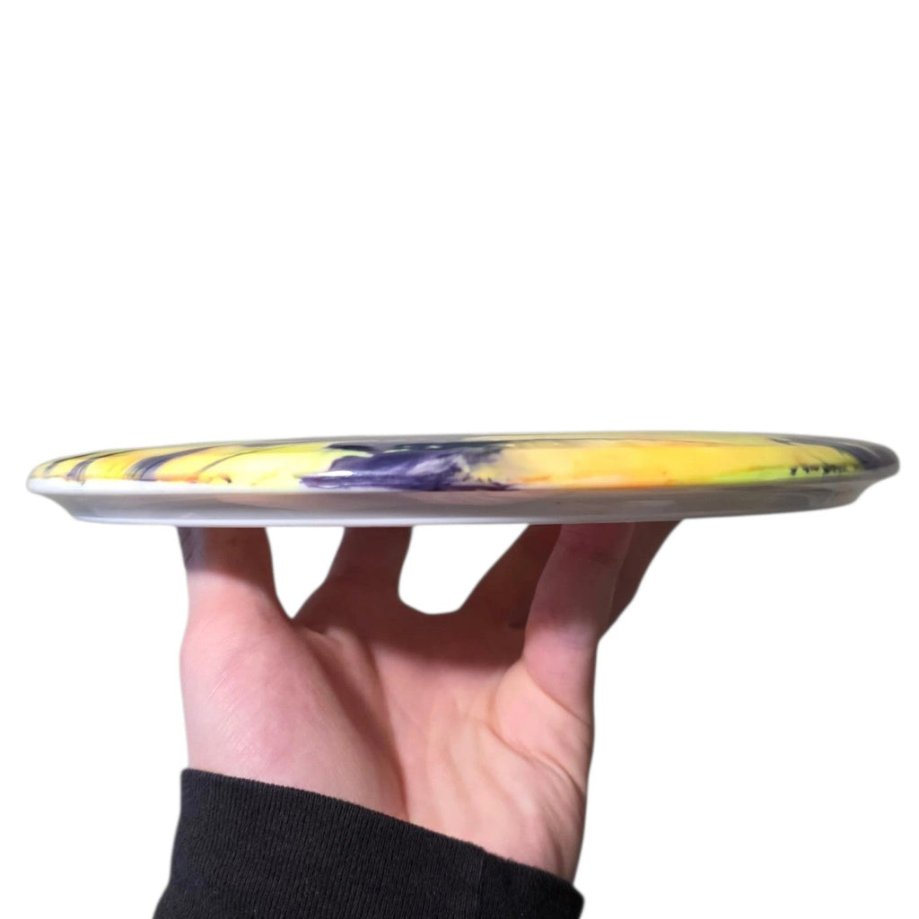 Yellow and purple dye on Thought Space Athletics Crux in Aura plastic, side profile