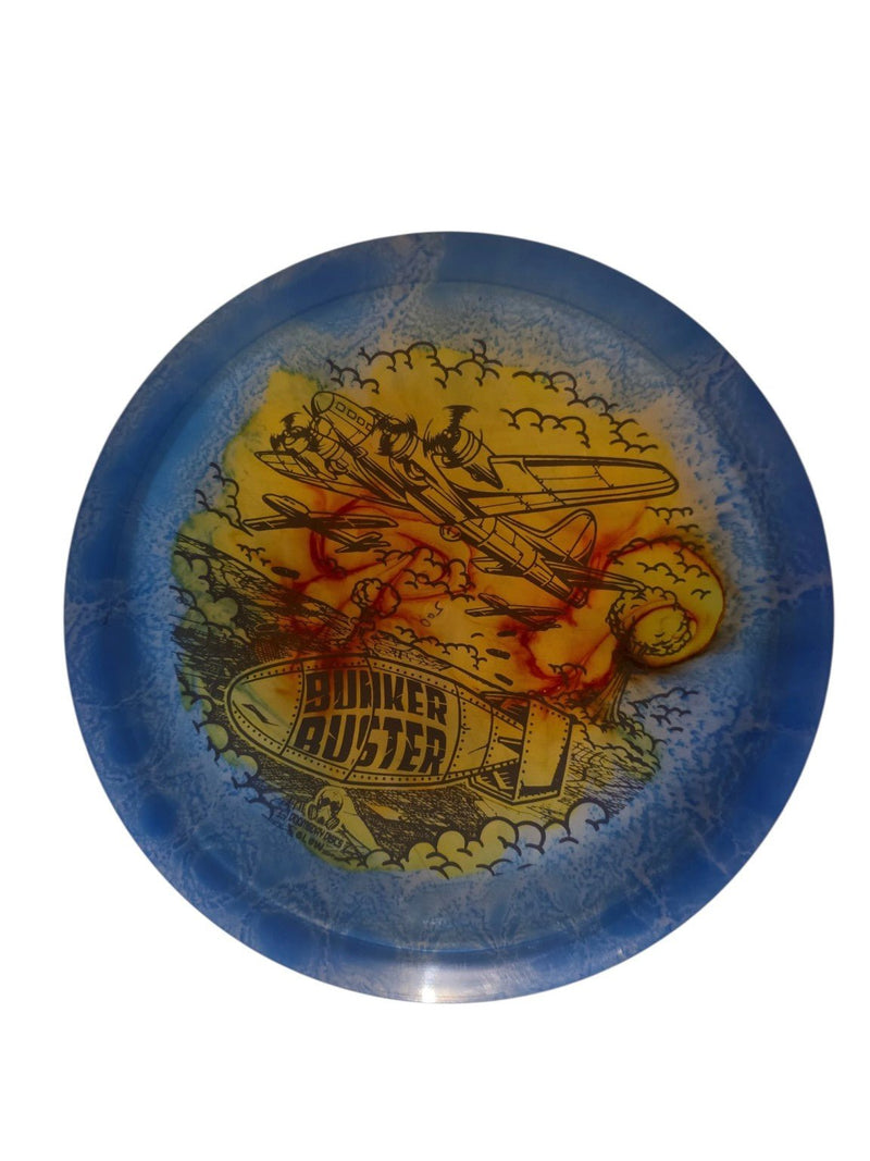 Yellow and red dye on Doomsday Discs Bunker Buster in Isolation Glow plastic, overhead view