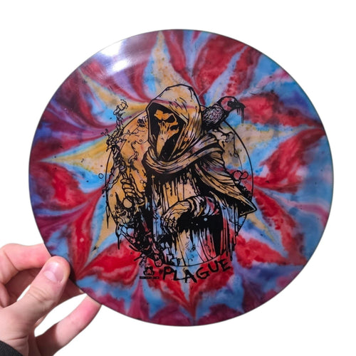Red and cyan dye on Doomsday Discs Plague in Radioactive Waste plastic, overhead view